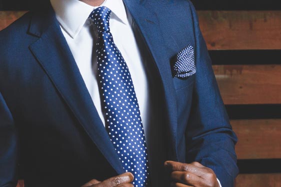 Person Wearing a Suit Close-up